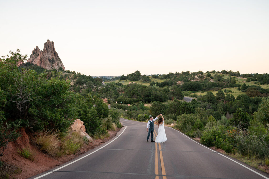 couple dancing in the middle of the road - colorado photographers, location for family photos