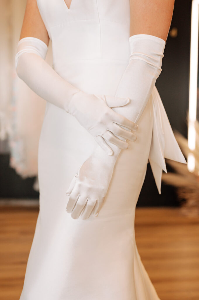 bride wearing gloves